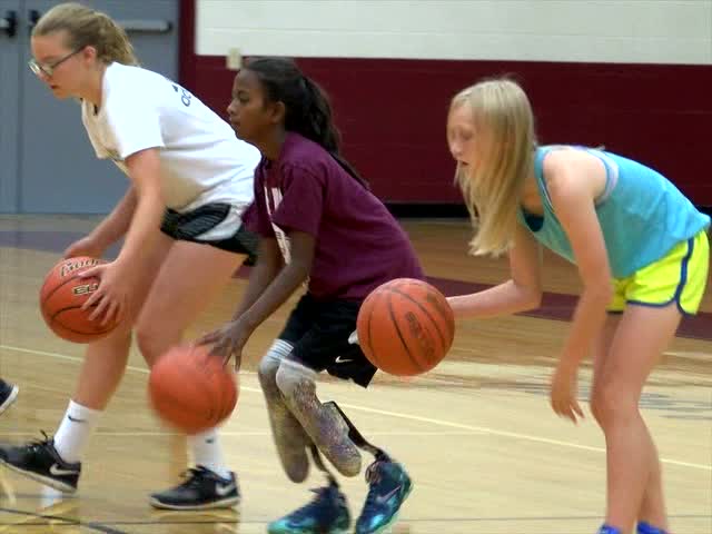 Teen basketball player in Butte with prosthetic legs inspires team-mates